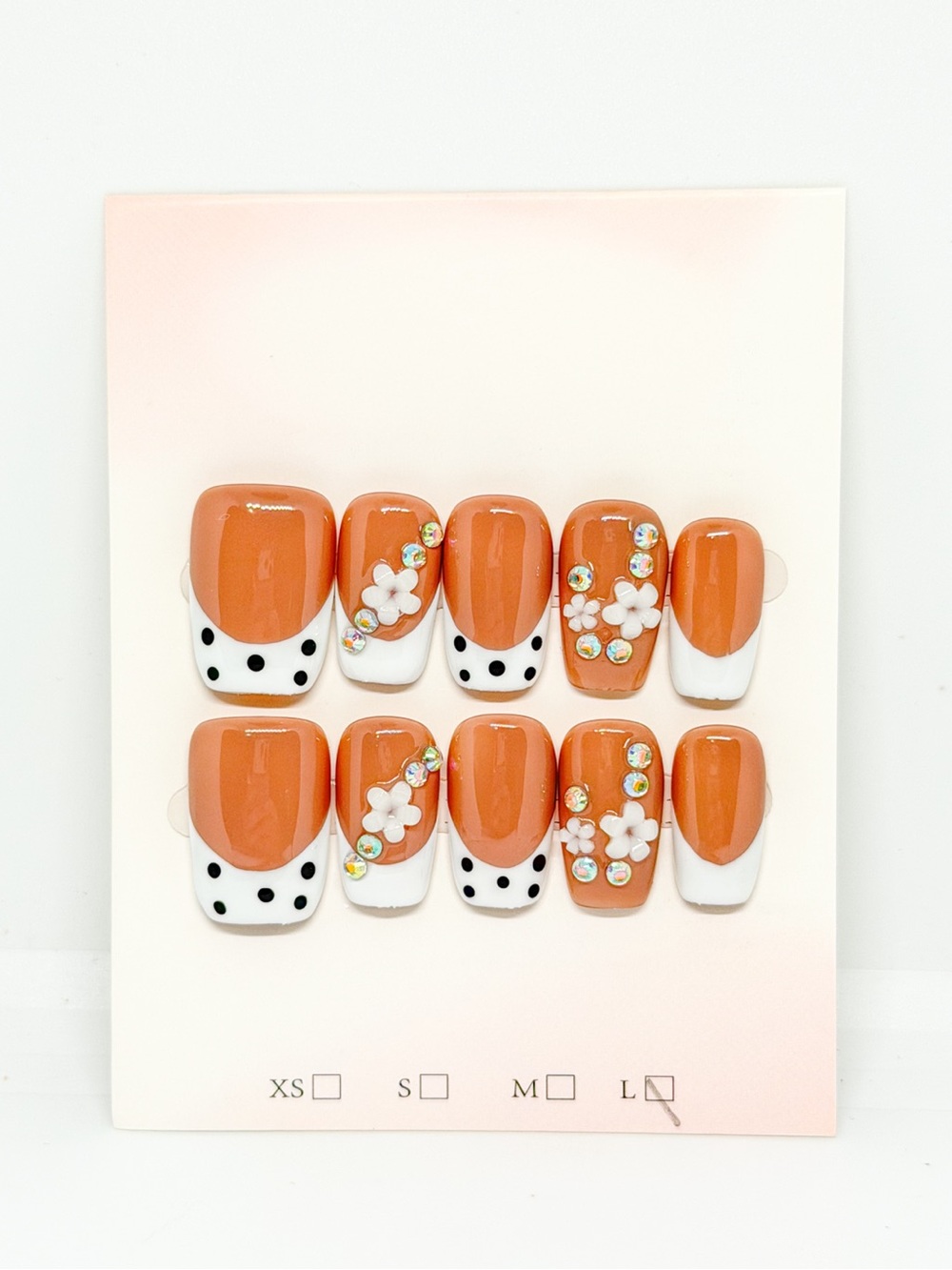 French tip press on nails with rhinestones and polka dots